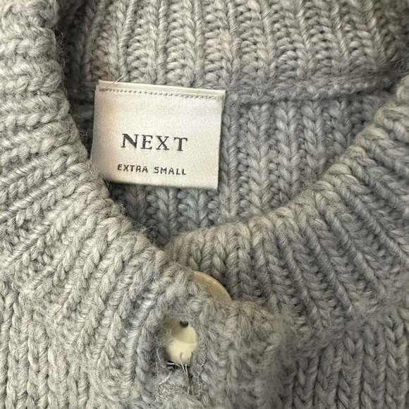 Cutest XS sweater. Gray. Buttons. Flares at bottom. Smells good/Clean. Brand new - Picture 4 of 5